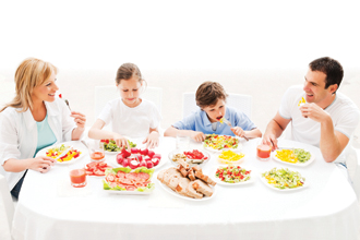 Above view of a happy family of four having dinning  in front of their home.  [url=http://www.istockphoto.com/search/lightbox/9786778][img]http://dl.dropbox.com/u/40117171/family.jpg[/img][/url] [url=http://www.istockphoto.com/search/lightbox/9786750][img]http://dl.dropbox.com/u/40117171/summer.jpg[/img][/url]